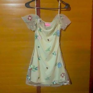 Cold shoulder mesh mini dress.